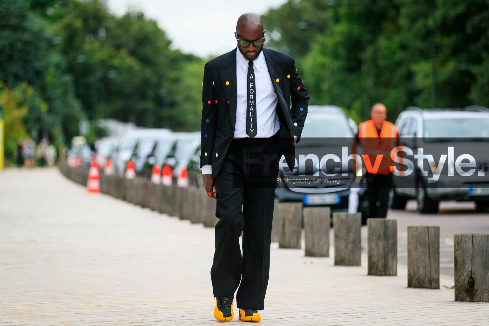 black jacket, black suits, black tie, black pants, white shirt, button details, button jacket, multicolor jacket, polka dots jacket, letter printed tie, scale sunglasses, louis vuitton sunglasses, black sneackers, yellow sneakers, virgil abloh, fashion week, frenchystyle, FW, jonathan paciullo, street style, PFW, PARIS, AUTUMN WINTER 2021-2022, FALL WINTER 2021-2022, FW 21-22, atmosphere details, horizontal, full length