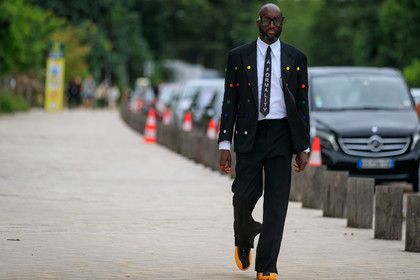 black jacket, black suits, black tie, black pants, white shirt, button details, button jacket, multicolor jacket, polka dots jacket, letter printed tie, scale sunglasses, louis vuitton sunglasses, black sneackers, yellow sneakers, virgil abloh, fashion week, frenchystyle, FW, jonathan paciullo, street style, PFW, PARIS, AUTUMN WINTER 2021-2022, FALL WINTER 2021-2022, FW 21-22, atmosphere details, horizontal, full length