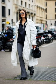 white jakcet, rain coat, zipped hoodie, black hoodie, grey trousers, pleated trousers, black shoes, helmet, menswear, fashion week, frenchystyle, FW, jonathan paciullo, street style, PFW, PARIS, AUTUMN WINTER 2022-2023, FALL WINTER 2022-2023, FW 22-23, full length, vertical