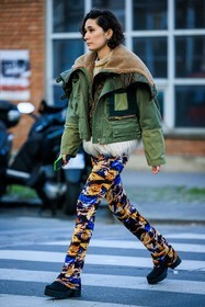 green jacket, bomber jacket, furry hood, puffed jacket, printed trousers, multicolor trousers, black boots, black shoes, short hair, fashion week, frenchystyle, FW, jonathan paciullo, street style, PFW, PARIS, menswear, AUTUMN WINTER 2022-2023, FALL WINTER 2022-2023, FW 22-23, full length, vertical