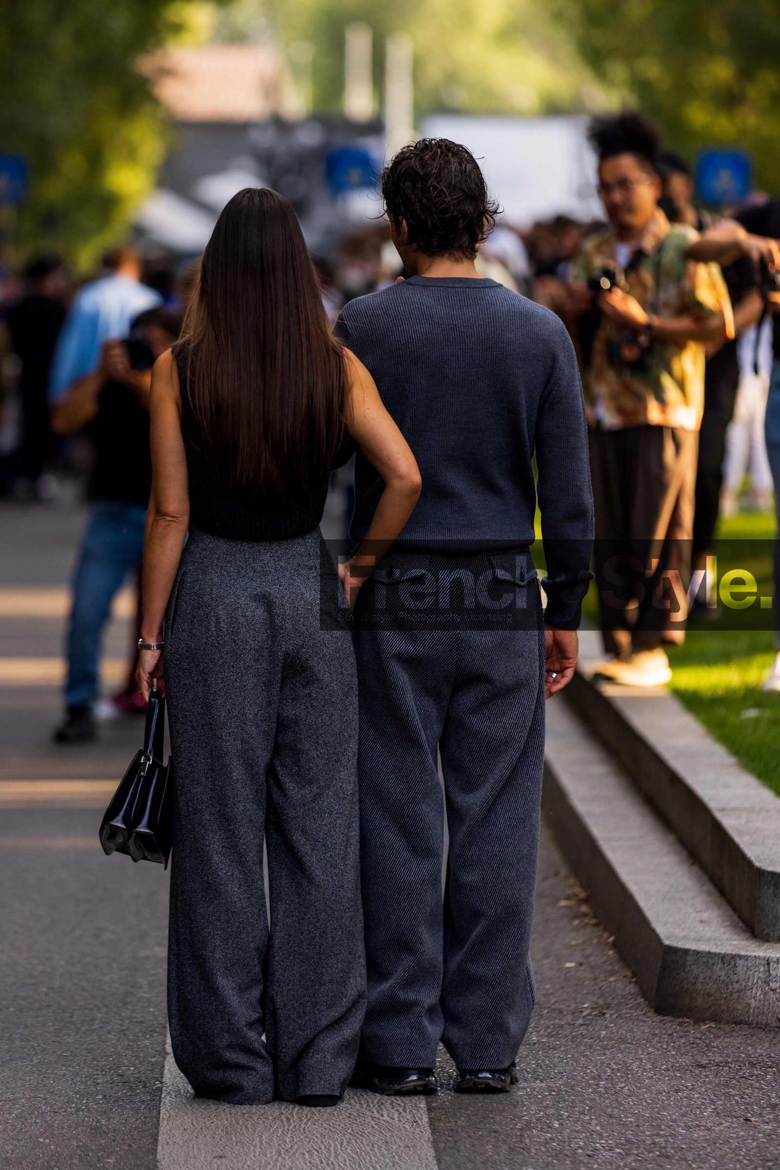 Alice Barbier, belted pants, black bag, black shoes, cardigan, couple, duo, grey knit, grey monochrome, Jean-Sebastien Roques, knit, large pants, leather bag, leather shoes, menswear, monochrome, oversize pants, ribbed cardigan, sleveless cardigan, wool pants, back, back detail, fashion week, frenchystyle, FW, jonathan paciullo, street style, MFW, MILAN, SPRING SUMMER 2022, SS 22, vertical, atmosphere details, detail