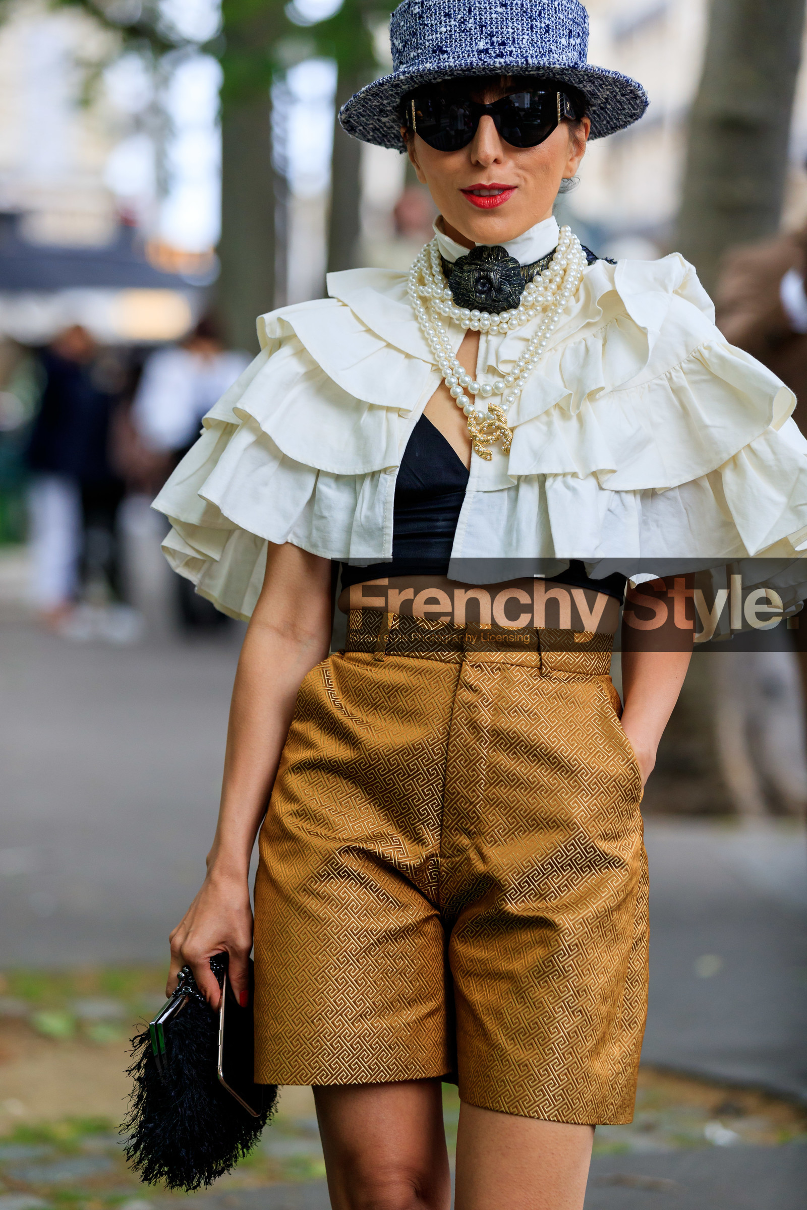 blue hat, tweed hat, white cape, ruffle cape, camel shorts, high waist shorts, corduroy shorts, givenchy shorts, flower shape necklace, pearl necklace, chanel necklace, chanel sunglasses, black sunglasses, fashion week, frenchystyle, FW, jonathan paciullo, street style, PFW, PARIS, AUTUMN WINTER 2021-2022, FALL WINTER 2021-2022, FW 21-22, vertical, atmosphere details, detail