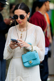 nude dress, silk dress, long sleeves dress, round shape glasses, round shape sunglasses, black sunglasses, chain strap sunglasses, multi necklace, long necklace, golden necklace, belted dress, pearl belt, blue leather bag, square shape bag, hand bag, quilted bag, chain strap bag, chanel bag, chanel belt, chanel dress, chanel sunglasses, chanel total look, pearl necklace, stone necklace, white dress, fashion week, frenchystyle, FW, jonathan paciullo, street style, PFW, PARIS, AUTUMN WINTER 2021-2022, FALL WINTER 2021-2022, FW 21-22, vertical, atmosphere details, detail