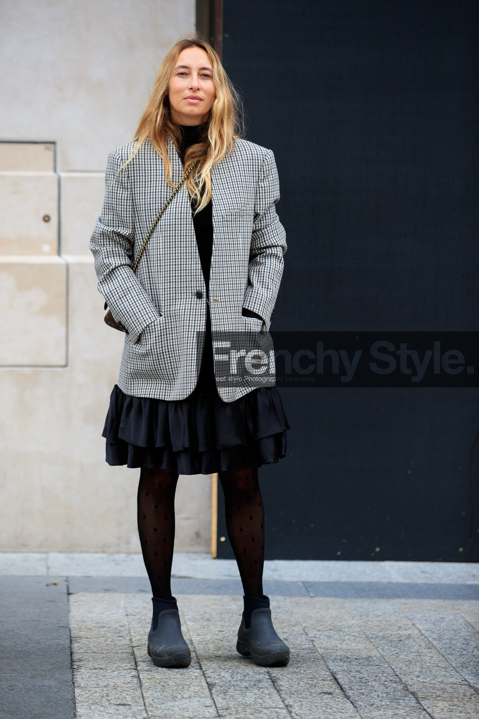 alexandra golovanoff, oversize jacket, checked jacket, beige jacket, black dress, black tights, black boots, ruffle dress, rain boots, low boots, plastic boots, chelsea boots, monogrammed tights, plumetis tights, kaki bag, satin dress, PARIS, PFW, fashion week, frenchystyle, FW, jonathan paciullo, street style, SPRING SUMMER 2021, SS 21, vertical, full length