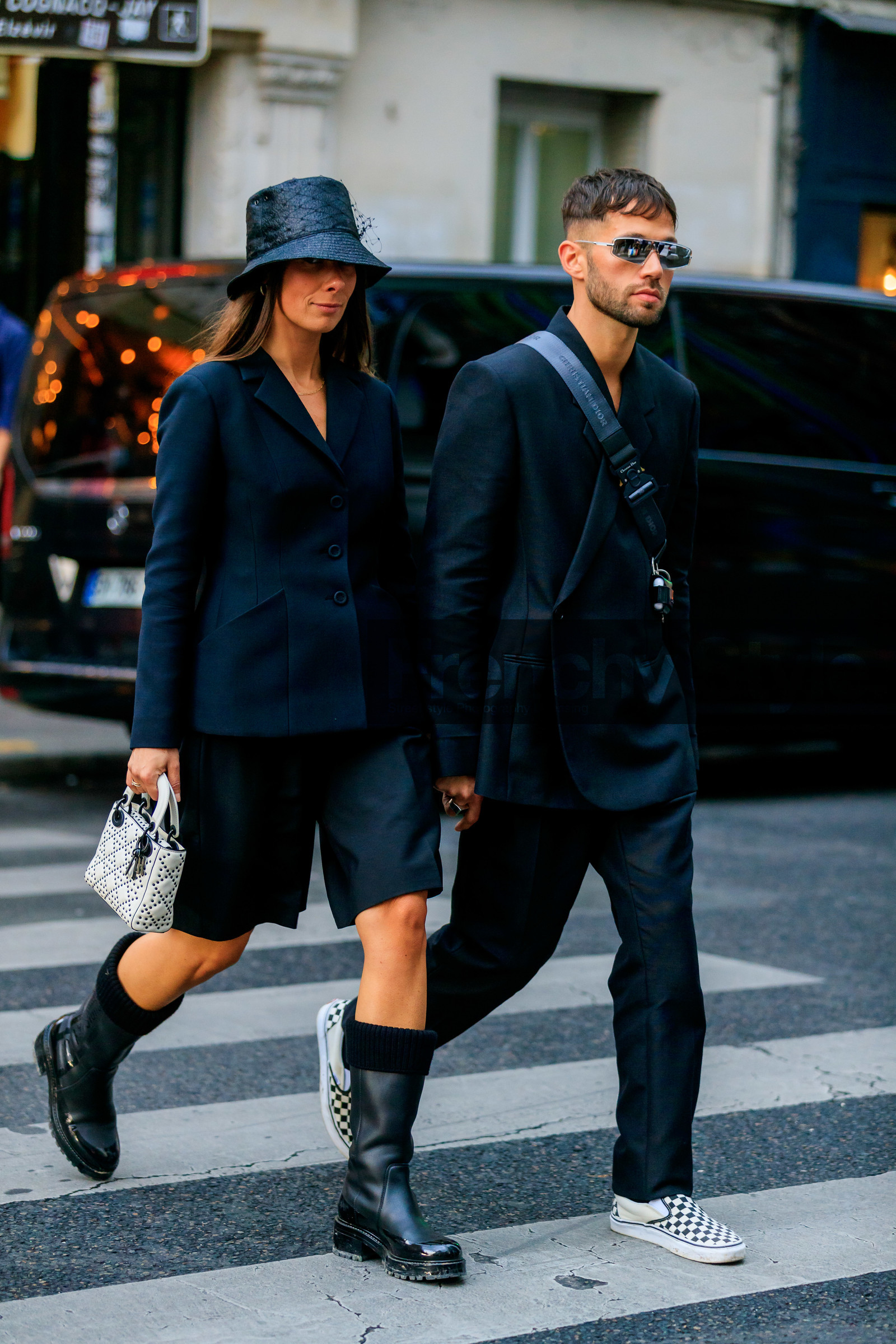 alice & j.s, alice barbier, JS roques, black jacket, white sunglasses, futurist shape sunglasses, black pants, black bermuda shorts, dior bag, dior boots, dior jacket, dior pants, dior shorts, dior total look, monogrammed bag, crossbody bag, black hat, black leather boots, vans shoes, checked shoes, lady dior bag, hand bag, studs details bag, white leather bag, flat boots, dior hat, dior strap bag, fashion week, frenchystyle, FW, jonathan paciullo, street style, SPRING SUMMER 2020, SS 20, PFW, PARIS, vertical, full length