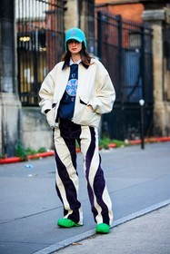 blue cap, logo cap, white jacket, bomber jacket, printed sweatshirt, dual toned pants, black and white pants, green shoes, black trousers, white trousers, fashion week, frenchystyle, FW, jonathan paciullo, street style, PFW, PARIS, menswear, AUTUMN WINTER 2022-2023, FALL WINTER 2022-2023, FW 22-23, full length, vertical