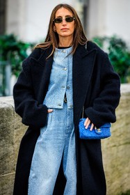 black coat, fluffy coat, black sunglasses, silver earrings, pastel blue cardigan, buttoned cardigan, light blue jeans, baggy jeans, chanel bag, blue handbag, small bag, fashion week, frenchystyle, FW, jonathan paciullo, street style, PFW, PARIS, menswear, AUTUMN WINTER 2022-2023, FALL WINTER 2022-2023, FW 22-23, atmosphere details, detail, vertical