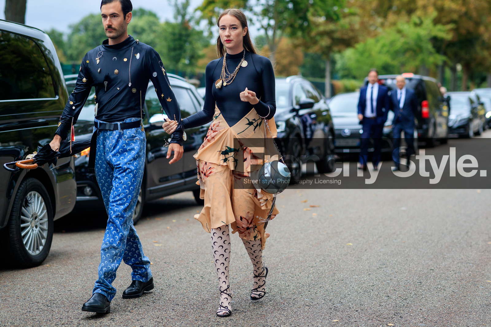 leather total look, marine serre bag, marine serre dress, marine serre look, marine serre pants, marine serre necklace, marine serre tights, black top, turtleneck dress, turtleneck top, embroidered top, technical fabric top, technical fabric dress, shell necklace, multi necklace, chain necklace, pink dress, ruffle dress, floral printed dress, round shape bag, silvered chain strap bag, silvered bag, monogrammed tights, monogrammed pants, black leather sandals, multi straps sandals, blue jeans, fashion week, frenchystyle, FW, jonathan paciullo, street style, SPRING SUMMER 2020, SS 20, PFW, PARIS, horizontal, atmosphere details, full length