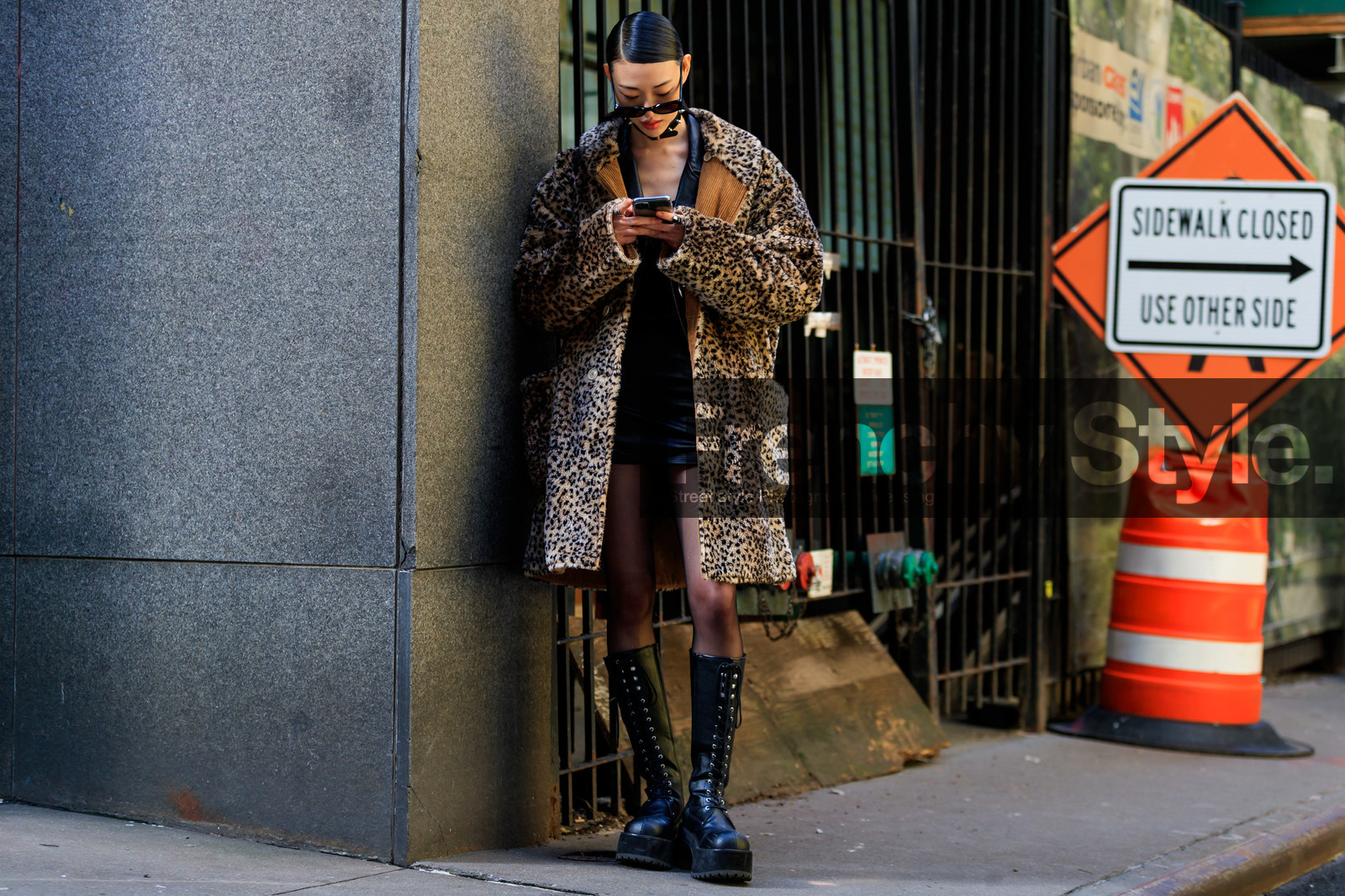 model, sora choi, leopard printed coat, fur coat, black leather jacket, black leather dress, black leather boots, high boots, flat boots, laced boots, black tights, beige coat, iphone, smartphone, fashion week, frenchystyle, FW, jonathan paciullo, street style, NYFW, NEW YORK, AUTUMN WINTER 2020-2021, FALL WINTER 2020-2021, FW 20-21, horizontal, atmosphere details, full length