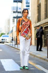 multicolor blouse, multicolor top, patchwork blouse, patchwork top, embroidered blouse, embroidered top, floral printed blouse, floral printed top, white jeans, white leather sneakers, green leather sneakers, nike shoes, pearl embroidered blouse, pearl embroidered top, plaited hair, fashion week, frenchystyle, FW, jonathan paciullo, street style, PFW, PARIS, AUTUMN WINTER 2021-2022, FALL WINTER 2021-2022, FW 21-22, vertical, full length, model