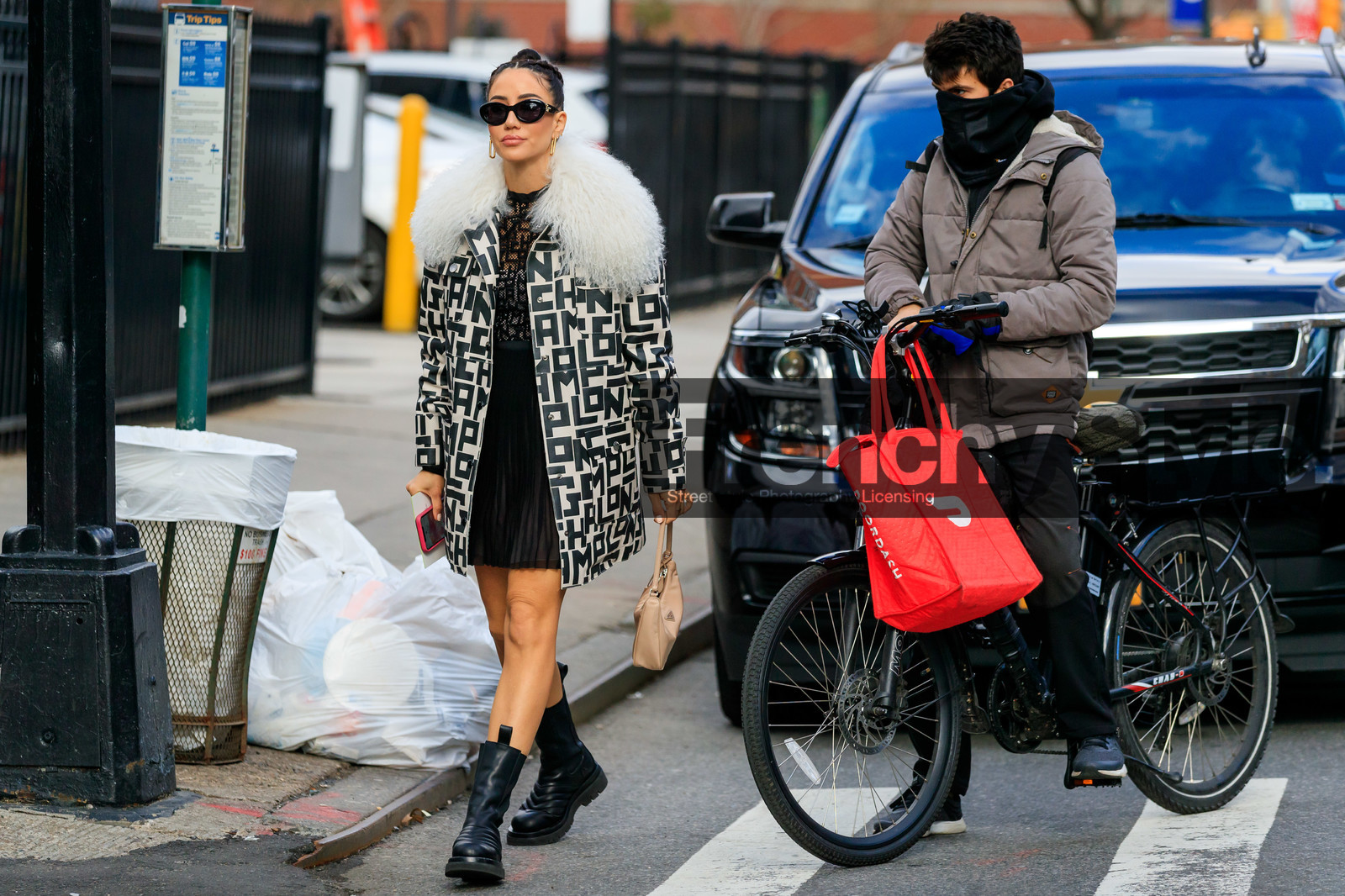 tamara kalinic, longchamps coat, white coat, black coat, fur coat, logo printed coat, monogrammed coat, longchamps dress, pleated dress, black dress, lace dress, monogrammed dress, prada bag, light beige bag, hand bag, black sunglasses, strassed sunglasses, golden earrings, dangling earrings, black leather boots, chelsea boots, flat boots, quilted boots, mini dress, fashion week, frenchystyle, FW, jonathan paciullo, street style, AUTUMN WINTER 2020-2021, FALL WINTER 2020-2021, FW 20-21, horizontal, atmosphere details, full length, NYFW, NEW YORK