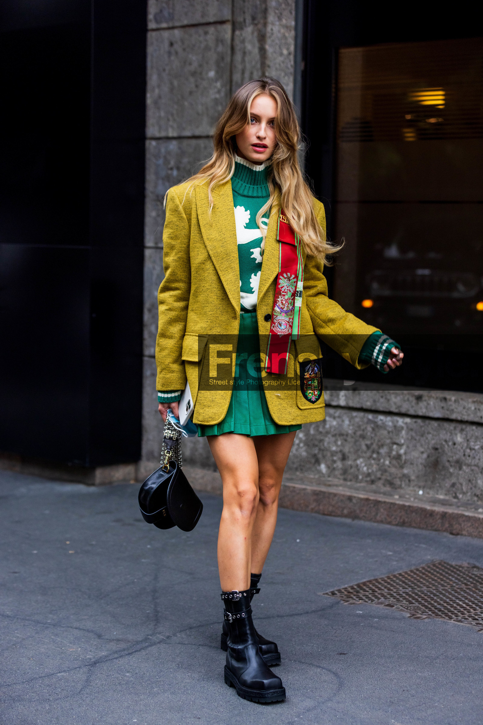 badge, bag, Beatrice Vendramin, black bag, black boots, blazer, boots, college look, color, green knit, green skirt, green turtleneck, knit, leather bag, leather boots, mini skirt, pleated skirt, printed knit, turtleneck, wool blazer, yellow blazer, fashion week, frenchystyle, FW, jonathan paciullo, street style, SPRING SUMMER 2022, SS 22, MFW, MILAN, vertical, full length