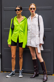 bicycle short, black converse, boots, brown boots, converse, dress, duo, green shirt, leather boots, Mica Argañaraz, Rianne Van Rompaey, shirt, shirt dress, short, sunglasses, fashion week, frenchystyle, FW, jonathan paciullo, street style, MFW, MILAN, SPRING SUMMER 2022, SS 22, vertical, full length