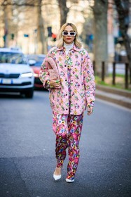 white sunglasses, pink jacket, pink pants, flowered suit, pink bag, furry bag, fluffy bag, white turtleneck, multicolor jacket, multicolor pants, white stilettos, green rings, fashion week, frenchystyle, FW, jonathan paciullo, street style, vertical, full length