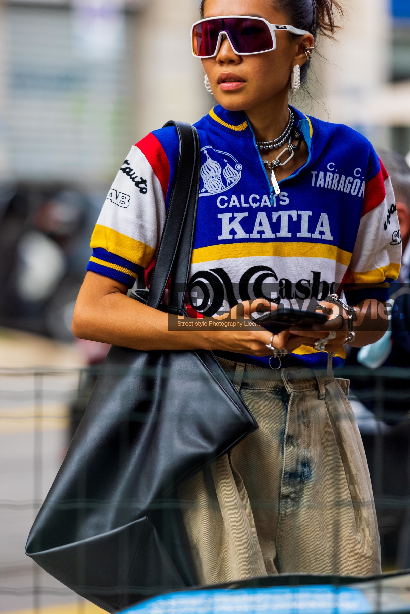 bag, black bag, denim, football top, jeans, leather bag, mask sunglasses, smartphone, sport top, sunglasses, over size bag, fashion week, frenchystyle, FW, jonathan paciullo, street style, MFW, MILAN, SPRING SUMMER 2022, SS 22, vertical, atmosphere details, detail