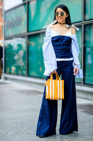 AUTUMN WINTER 2017-2018, AW 17-18, balenciaga, black boots, black shoes, blue shirt, bustier top, choker, FALL WINTER 2017-2018, fashion week, frenchystyle, full length, FW, FW 17-18, graphic bag, jonathan paciullo, leather bag, leather shoes, MFW, MILAN, navy pants, necklace, off the shoulder, printed bag, street style, striped bag, sunglasses, trousers, vertical, wide pants, yellow bag