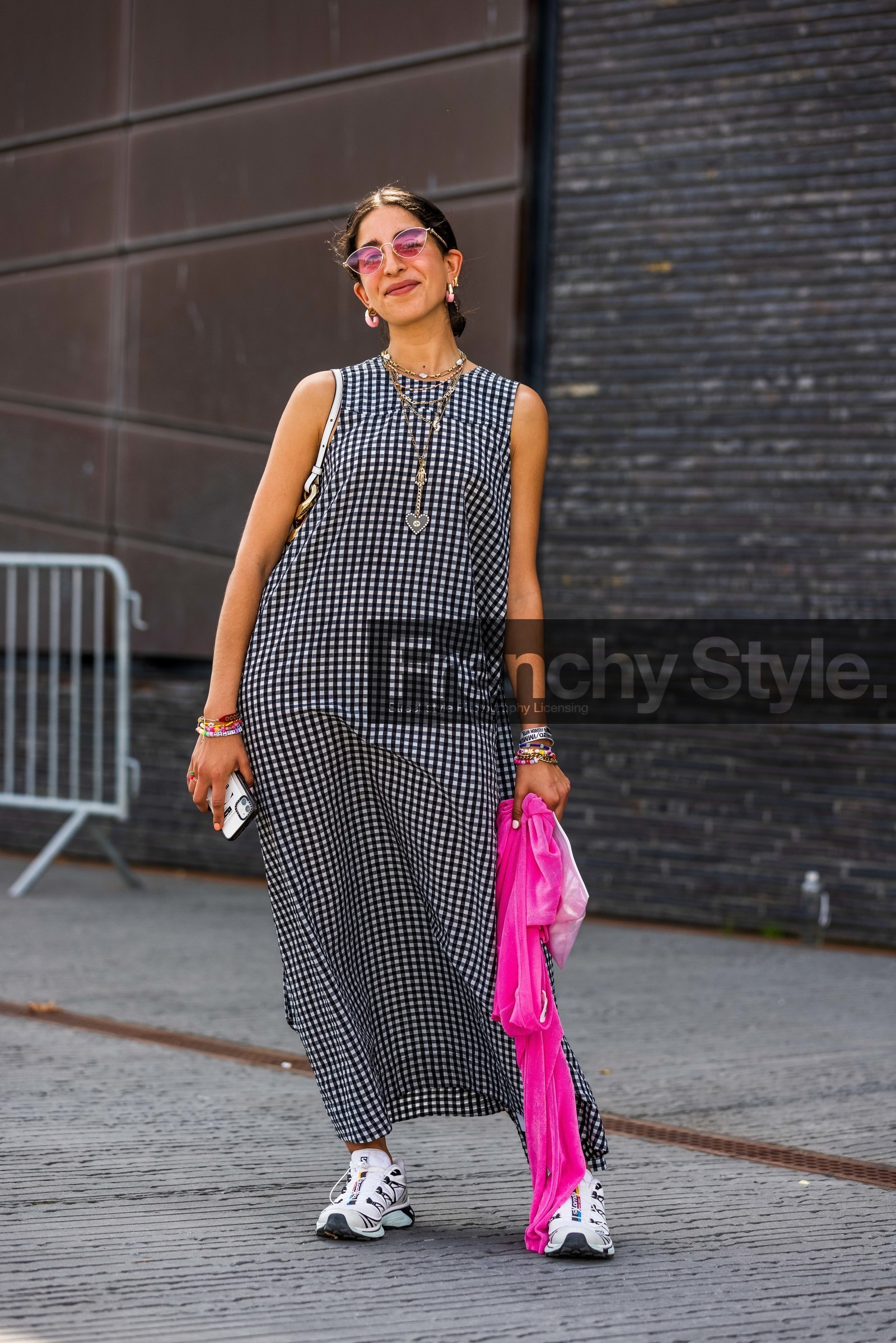 Selma Kaci, vichy printed dress, black dress, white dress, bicolor dress, checked dress, sleeveless dress, loose dress, long dress, golden necklace, long necklace, multi necklace, charms necklace, gucci necklace, heart shape necklace, multi earrings, pink earrings, orange earrings, hoop earrings, letters necklace, pearl necklace, pink sunglasses, golden frame sunglasses, pearl bracelet, multicolor bracelet, multi bracelet, lucky charm bracelet, white sneakers, salomon sneakers, gucci sunglasses, fashion week, frenchystyle, FW, jonathan paciullo, street style, SPRING SUMMER 2022, SS 22, COPENHAGEN, CPHFW, vertical, full length