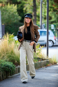 sophia roe, brown jacket, black cap, leather cap, oversize jacket, light beige pants, velvet pants, corduroy pants, hermes belt, black leather clutch, black leather belt, loose pants, silvered watch, rolex watch, PARIS, PFW, fashion week, frenchystyle, FW, jonathan paciullo, street style, SPRING SUMMER 2021, SS 21, vertical, full length