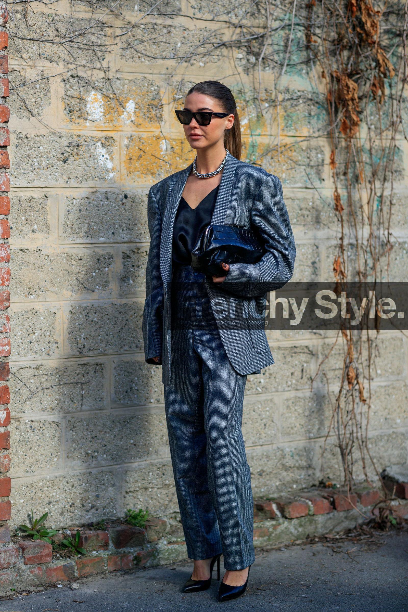 sophia roe, black jacket, black pants, black sunglasses, black top, black leather clutch, black leather shoes, satin top, low necked top, oversize jacket, houndstooth printed jacket, houndstooth printed pants, animal skin clutch, celine sunglasses, butterfly sunglasses, futurist shape sunglasses, silvered necklace, big necklace, high heels shoes, fashion week, frenchystyle, FW, jonathan paciullo, street style, MFW, MILAN, AUTUMN WINTER 2020-2021, FALL WINTER 2020-2021, FW 20-21, vertical, full length