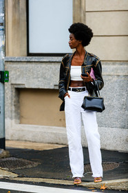 black leather jacket, black leather bag, black leather belt, used jacket, zipped jacket, white pants, flare pants, hand bag, vintage bag, belted pants, white top, cropped top, animal skin belt, sasha payton, street style, jonathan paciullo, FW, frenchystyle, fashion week, MFW, MILAN, SPRING SUMMER 2021, SS 21, vertical, full length, model