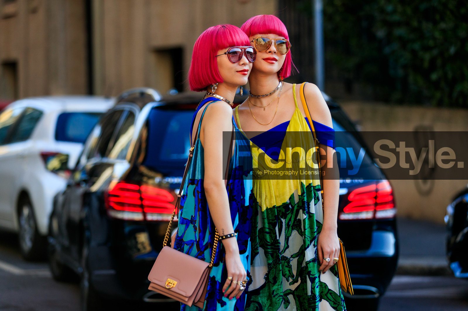 Ami and Aya Suzuki, ferragamo bag, yellow dress, light blue dress, sleeveless dress, half shoulder dress, long dress, animal print dress, printed dress, green dress, bicolor dress, yellow leather bag, shoulder bag, golden strap bag, nude leather bag, pink hair, dyed hair, aviator sunglasses, pink sunglasses, yellow sunglasses, silvered choker, golden earrings, multi necklace, strassed earrings, dangling earrings, low necked dress, fashion week, frenchystyle, FW, jonathan paciullo, street style, MFW, MILAN, AUTUMN WINTER 2020-2021, FALL WINTER 2020-2021, FW 20-21, horizontal, atmosphere details, detail