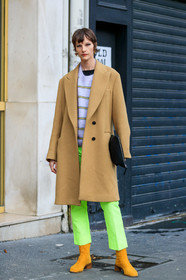 model, sara blomqvist, beige coat, white pullover, striped pullover, neon green pants, cropped pants, camel suede boots, black leather clutch, black eyeliner, green eyeliner, make up, make up details, fashion week, frenchystyle, FW, jonathan paciullo, street style, PFW, PARIS, vertical, full length