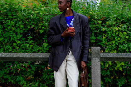 model, black leather jacket, white leather pants, oversize jacket, blue blouse, floral printed blouse, golden earrings, dangling earrings, brown leather bag, box bag, hand bag, fashion week, frenchystyle, FW, jonathan paciullo, street style, SPRING SUMMER 2020, SS 20, PFW, PARIS, horizontal, atmosphere details, detail