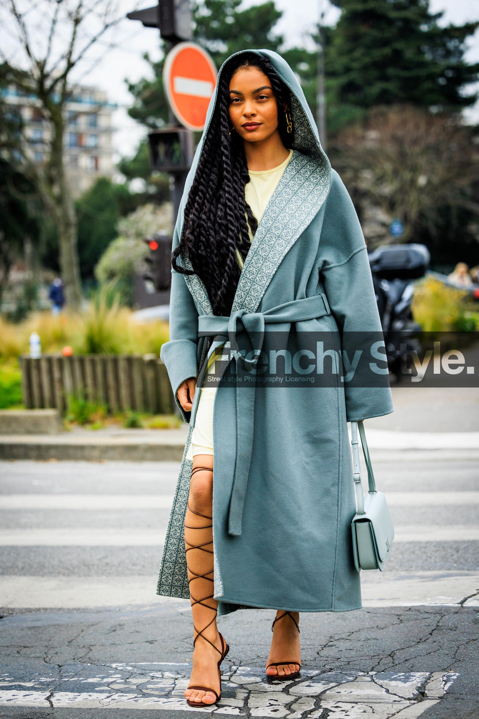 long braids, pastel blue coat, oversized coat, greek sandals, laced sandals, heels, blue handbag, loewe coat, sharon alexie, street style, jonathan paciullo, FW, frenchystyle, fashion week, AUTUMN WINTER 2022-2023, FALL WINTER 2022_2023, FW 22-23, PFW, PARIS, full length, vertical