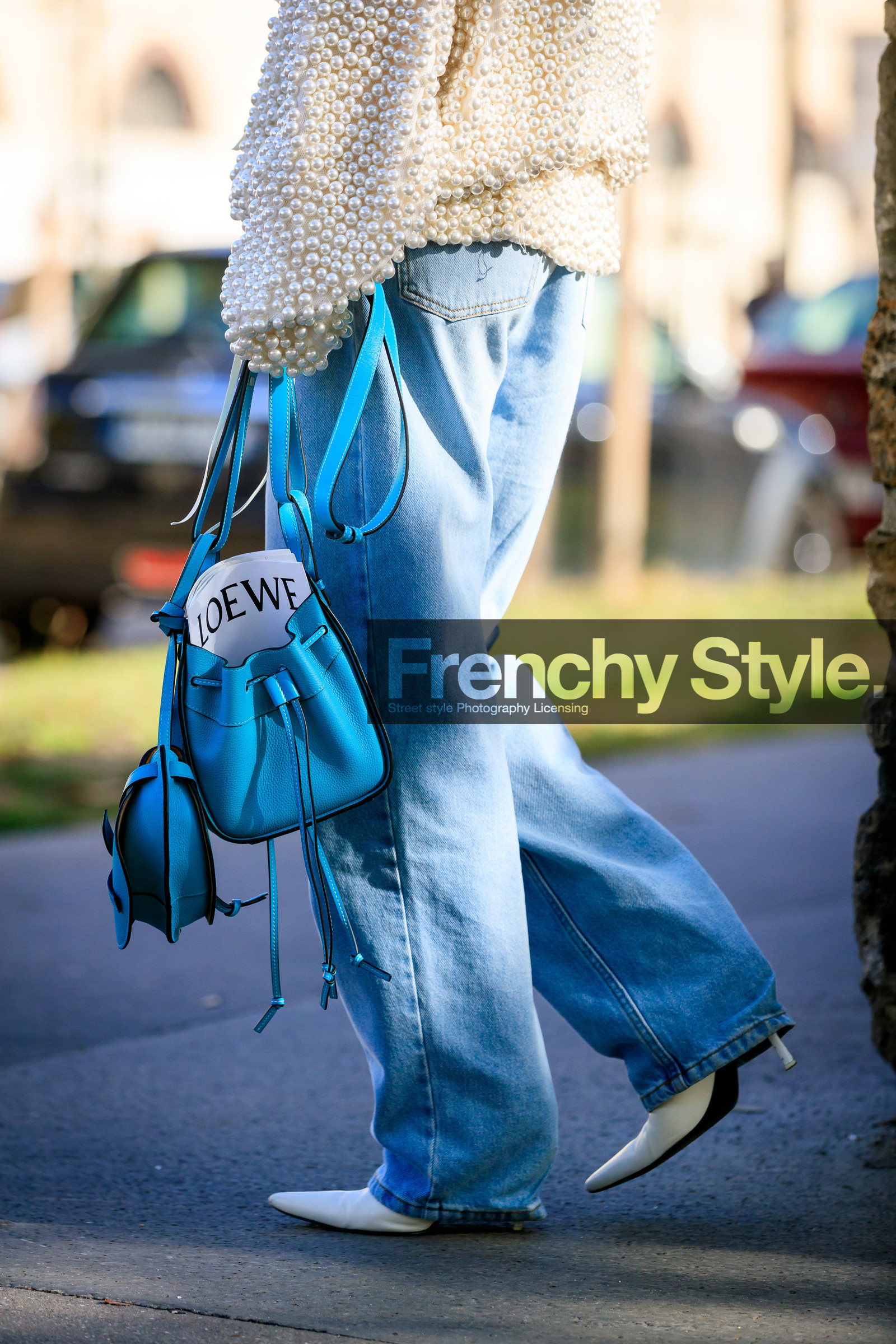 jeanette madsen, loewe bag, loewe pullover, light blue jeans, flare jeans, light blue leather bag, pearl embroidered top, white top, white leather shoes, high heels shoes, legs detail, fashion week, frenchystyle, FW, jonathan paciullo, street style, SPRING SUMMER 2020, SS 20, PFW, PARIS, vertical, atmosphere details, detail