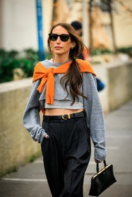 orange jumper, black sunglasses, cropped top, grey top, black belt, baggy pants, highwaist pants, black handbag, pencil bag, chloe loulou de saison, fashion week, frenchystyle, FW, jonathan paciullo, street style, AUTUMN WINTER 2022-2023, FALL WINTER 2022_2023, FW 22-23, PFW, PARIS, vertical, detail