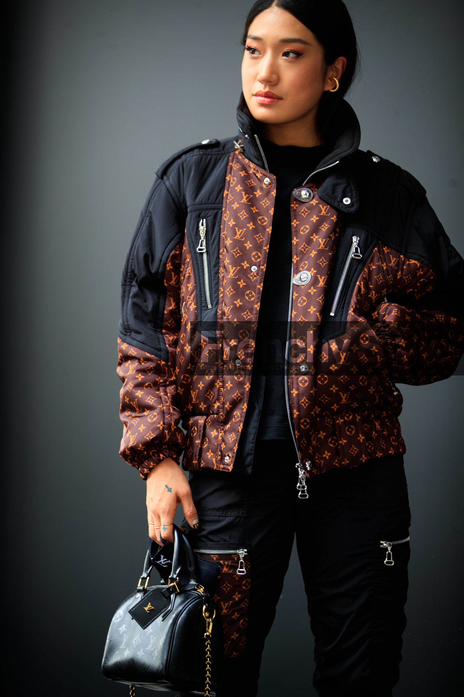peggy gould, black coat, black pants, black leather bag, brown coat, down jacket, zipped coat, monogrammed coat, monogrammed pants, monogrammed bag, hand bag, bowling bag, PARIS, PFW, fashion week, frenchystyle, FW, jonathan paciullo, street style, SPRING SUMMER 2021, SS 21, vertical, atmosphere details, detail