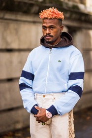 beige pants, blue hoddie, hairstyle, hoddie, menswear, orange hair, pants, pastel, stripes, watch, zipped hoddie, lacoste, fashion week, frenchystyle, FW, jonathan paciullo, street style, PFW, PARIS, SPRING SUMMER 2022, SS 22, vertical, atmosphere details
