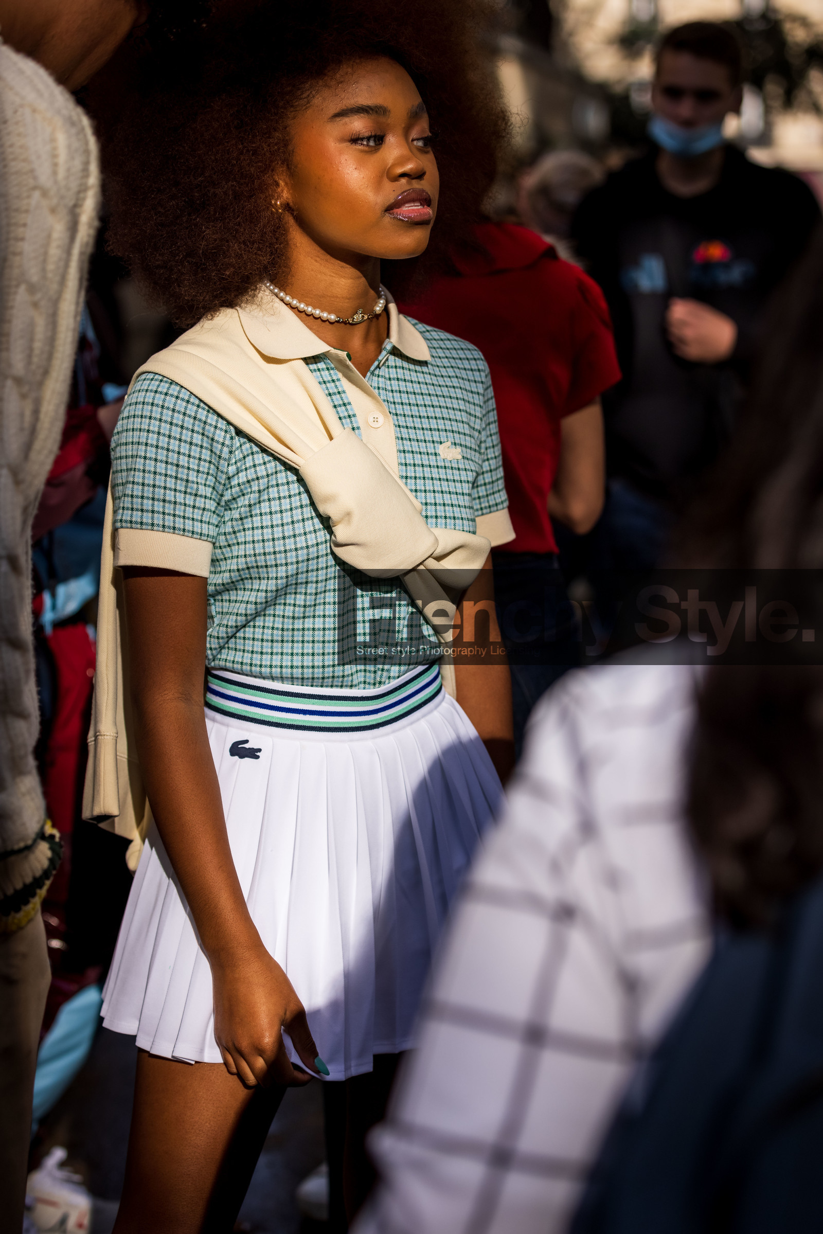 check, checked polo, green polo, Kayliah Balou, lacoste look, mini skirt, pleated skirt, polo, print, printed polo, skirt, tennis look, white skirt, lacoste, fashion week, frenchystyle, FW, jonathan paciullo, street style, PFW, PARIS, SPRING SUMMER 2022, SS 22, vertical, atmosphere details