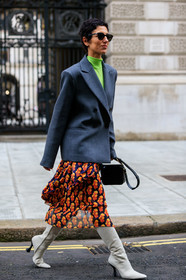 black bag, graphic skirt, green top, grey jacket, high boots, high heels, leather bag, leather shoes, neon, orange skirt, printed skirt, sunglasses, white boots, yasmin sewell, street style, jonathan paciullo, FW, frenchystyle, fashion week, LFW, LONDON, AUTUMN WINTER 2019-2020, AW 19-20, FW 19-20, FALL WINTER 2019-2020, vertical, full length