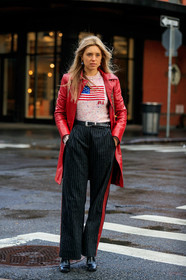 aemilia madden, red leather jacket, long jacket, ralph lauren pullover, light pink pullover, black leather belt, dark grey pants, striped pants, cowboy boots, black leather boots, cowboy belt, fashion week, frenchystyle, FW, jonathan paciullo, street style, AUTUMN WINTER 2020-2021, FALL WINTER 2020-2021, FW 20-21, vertical, full length, NYFW, NEW YORK