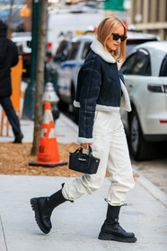 Charlotte Groeneveld, black bombers, black leather boots, black leather bag, suede bombers, chelsea boots, flat boots, big sole boots, mini bag, hand bag, fur coat, fur bombers, celine sunglasses, black sunglasses, futurist shape sunglasses, white leather pants, longchamp bag, fashion week, frenchystyle, FW, jonathan paciullo, street style, FALL WINTER 2020-2021, AUTUMN WINTER 2020-2021, FW 20-21, vertical, full length, NYFW, NEW YORK