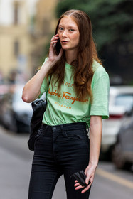 bag, black bag, black denim, black jean, color, denim, fluo green, freckles, green t-shirt, jean, logo t-shirt, red hair, Sara Grace Wallestedt, skinny jean, smartphone, t-shirt, fashion week, frenchystyle, FW, jonathan paciullo, street style, SPRING SUMMER 2022, SS 22, MFW, MILAN, vertical, atmosphere details