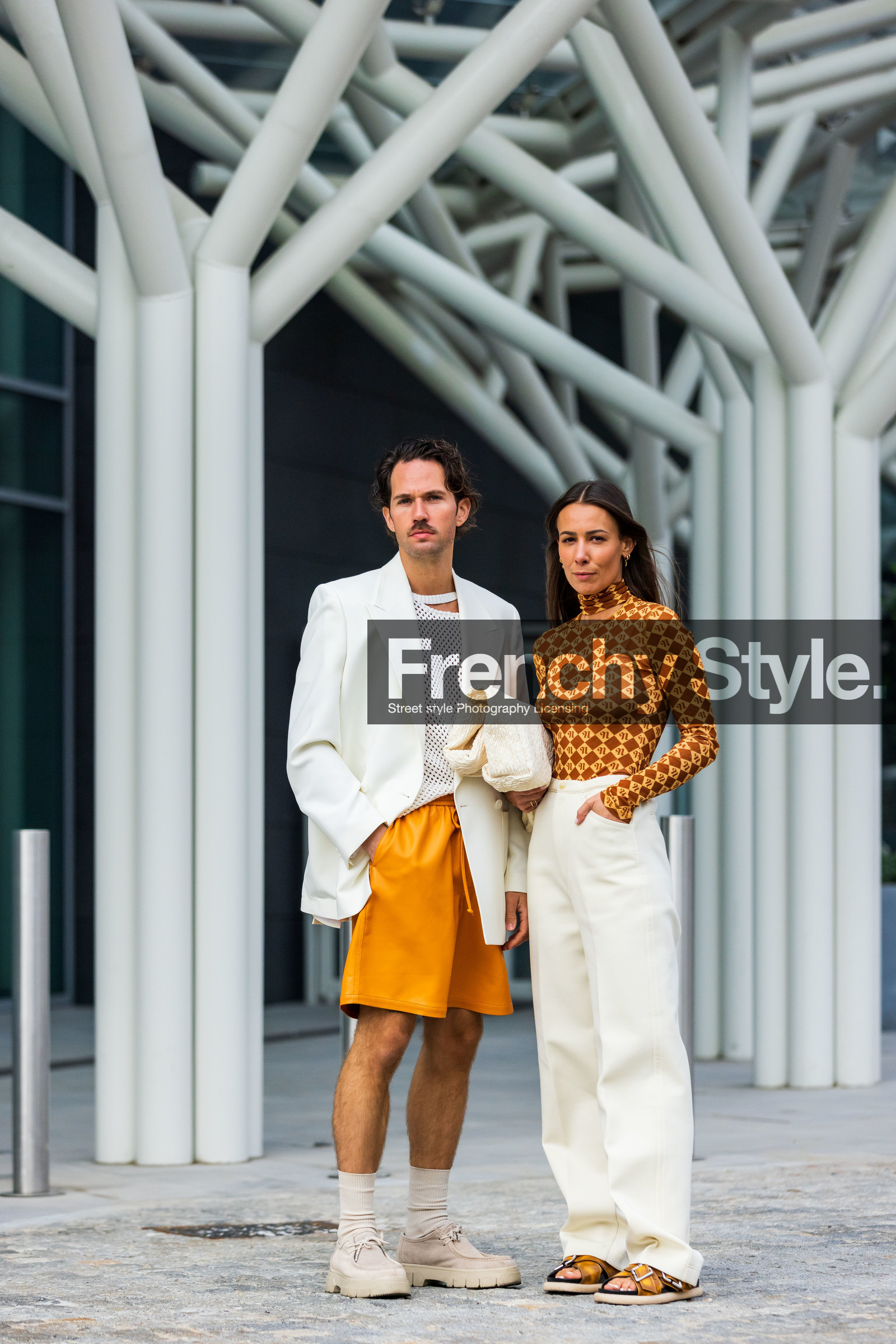 Alice Barbier, beige moccassins, beige shoes, color, couple, cream bag, cream pants, duo, Jean-Sebastien Roques, knit, menswear, mesh top, moccassins, orange short, orange turtleneck, pants, printed turtleneck, sandals, short, turtleneck, white bag, white blazer, white knit, white pants, white top, fashion week, frenchystyle, FW, jonathan paciullo, street style, SPRING SUMMER 2022, SS 22, MFW, MILAN, vertical, full length