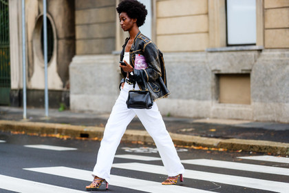 black leather jacket, black leather bag, black leather belt, used jacket, zipped jacket, white pants, flare pants, hand bag, vintage bag, belted pants, white top, cropped top, animal skin belt, sasha payton, street style, jonathan paciullo, FW, frenchystyle, fashion week, MFW, MILAN, SPRING SUMMER 2021, SS 21, horizontal, atmosphere details, full length, model
