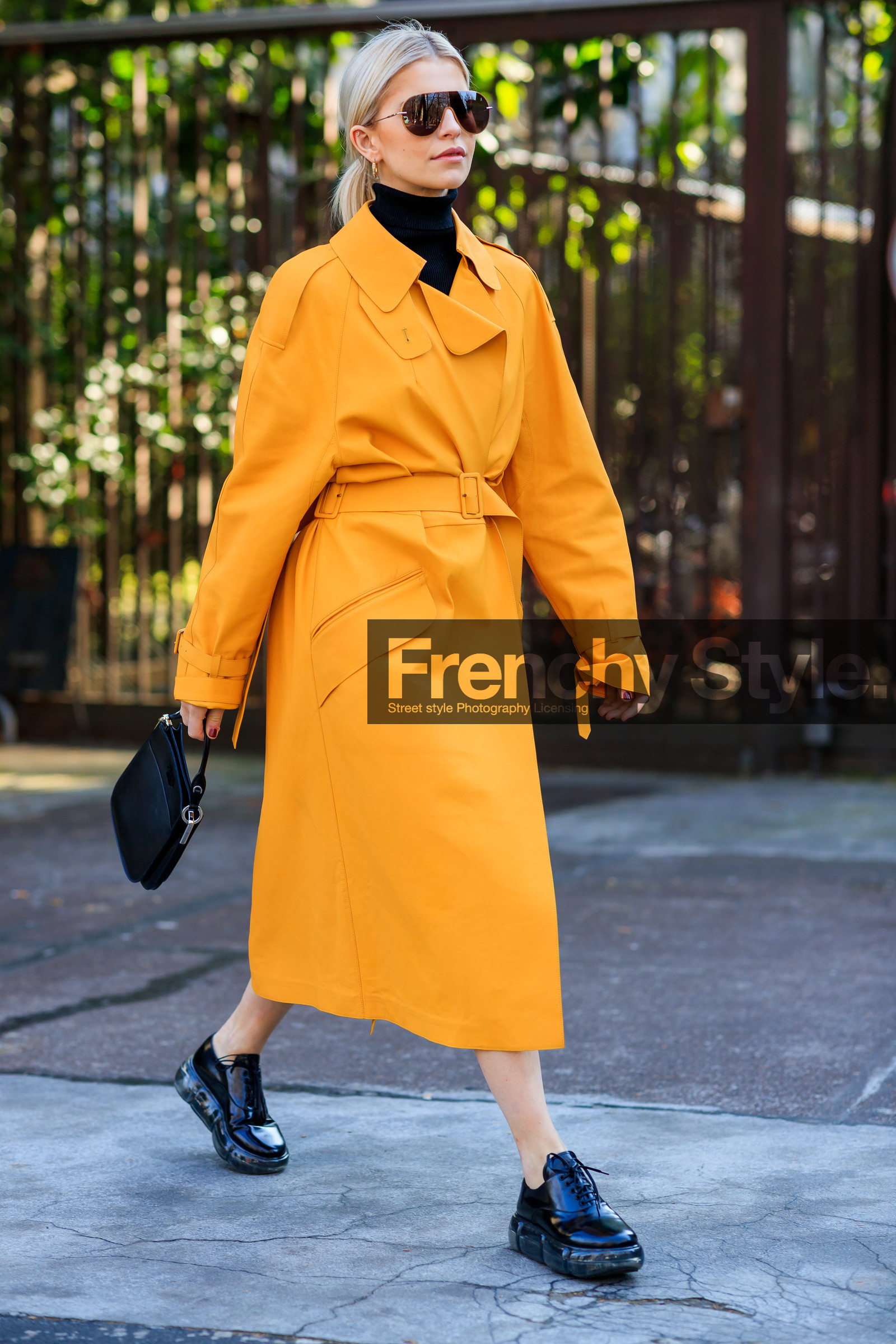 black bag, black shoes, black turtleneck, caro daur, earrings, leather bag, leather shoes, prada, sunglasses, trench coat, yellow coat, MILAN, MFW, fashion week, frenchystyle, FW, jonathan paciullo, street style, AUTUMN WINTER 2019-2020, AW 19-20, FALL WINTER 2019-2020, FW 19-20, vertical, full length