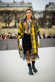 dior, plaid poncho, yellow poncho, lady dior bag, grey bag, midi skirt, laced skirt, black boots, christian dior, heart evangelista, fashion week, frenchystyle, FW, jonathan paciullo, street style, AUTUMN WINTER 2022-2023, FALL WINTER 2022_2023, FW 22-23, PFW, PARIS, vertical, full length