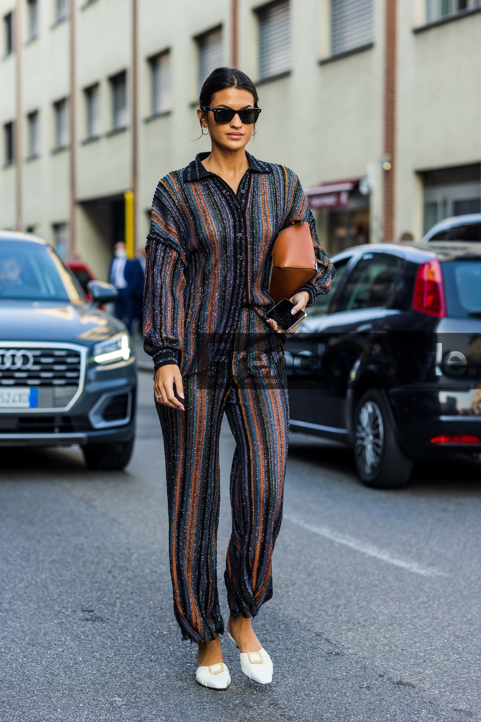 bun, camel bag, colored bag, hoops, leather bag, leather mules, loewe bag, Marta Lozano, print, printed pants, printed shirt, rayban, sequin, striped pants, striped shirt, stripes, sunglasses, white mules, white sandals, fashion week, frenchystyle, FW, jonathan paciullo, street style, MFW, MILAN, SPRING SUMMER 2022, SS 22, vertical, full length