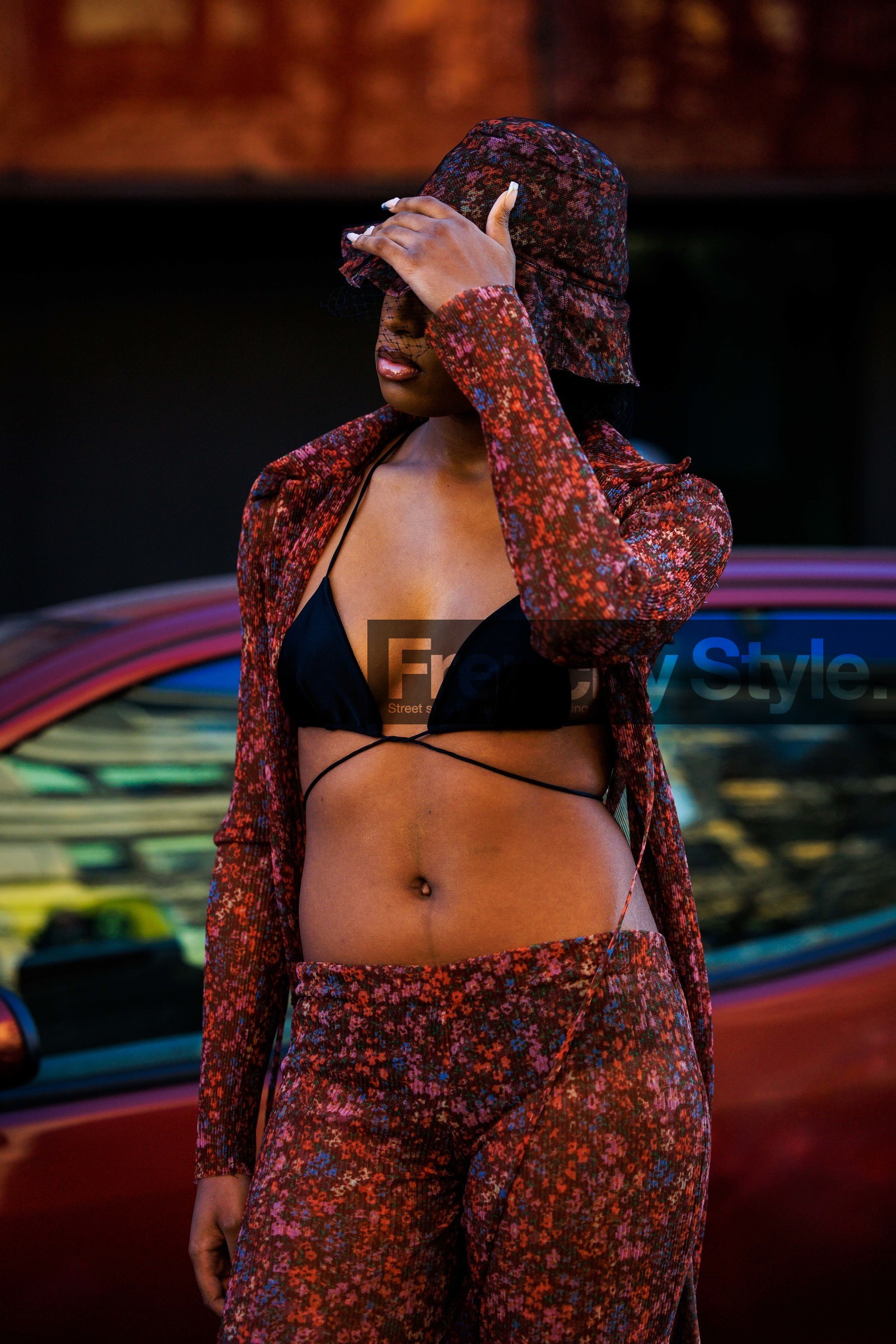 flowered pants, flowered bucket hat, cut out bra, black bra, flowered pants, red pants, red shirt, didi stone, fashion week, frenchystyle, FW, jonathan paciullo, street style, vertical, atmosphere details, detail