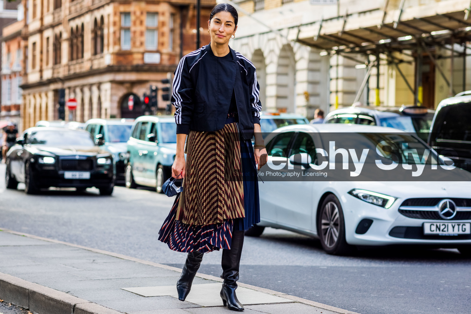 Caroline Issa, black, midi skirt, stripes, boots, leather, shirt, fashion week, frenchystyle, FW, jonathan paciullo, street style, SPRING SUMMER 2022, SS 22, LFW, LONDON, horizontal, full length, atmosphere details
