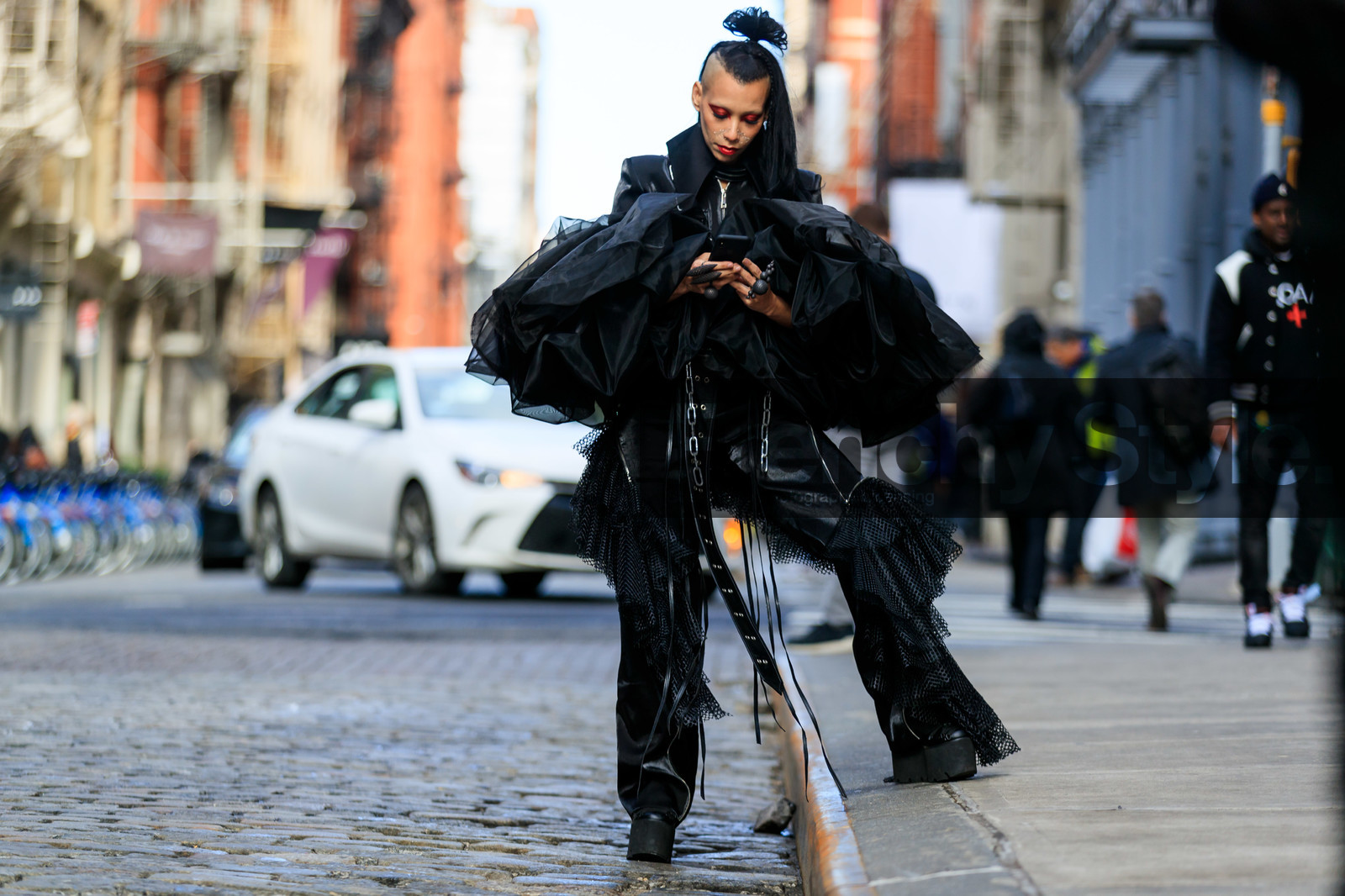 black jacket, black pants, black shoes, black top, bun, chains, eyeshadow, leather shoes, rings, ruffles, tone on tone, total look black, trousers, street style, jonathan paciullo, frenchystyle, NYFW, NEW YORK, AUTUMN WINTER 2019-2020, AW 19-20, FALL WINTER 2019-2020, FW 19-20, fashion week, FW, atmosphere details, horizontal, full length