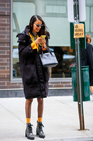 model, black leather bag, black coat, down jacket, yellow socks, floral printed boots, low boots, kitten heels boots, laced boots, prada bag, hand bag, yellow jacket, prada sunglasses, futurist shape sunglasses, iphone, fashion week, frenchystyle, FW, jonathan paciullo, street style, AUTUMN WINTER 2020-2021, FALL WINTER 2020-2021, FW 20-21, vertical, full length, NYFW, NEW YORK