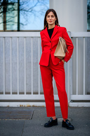 gala gonzalez, red jacket, red pants, beige leather clutch, black top, black leather loafers, prada shoes, fashion week, frenchystyle, FW, jonathan paciullo, street style, MFW, MILAN, AUTUMN WINTER 2020-2021, FALL WINTER 2020-2021, FW 20-21, vertical, full length