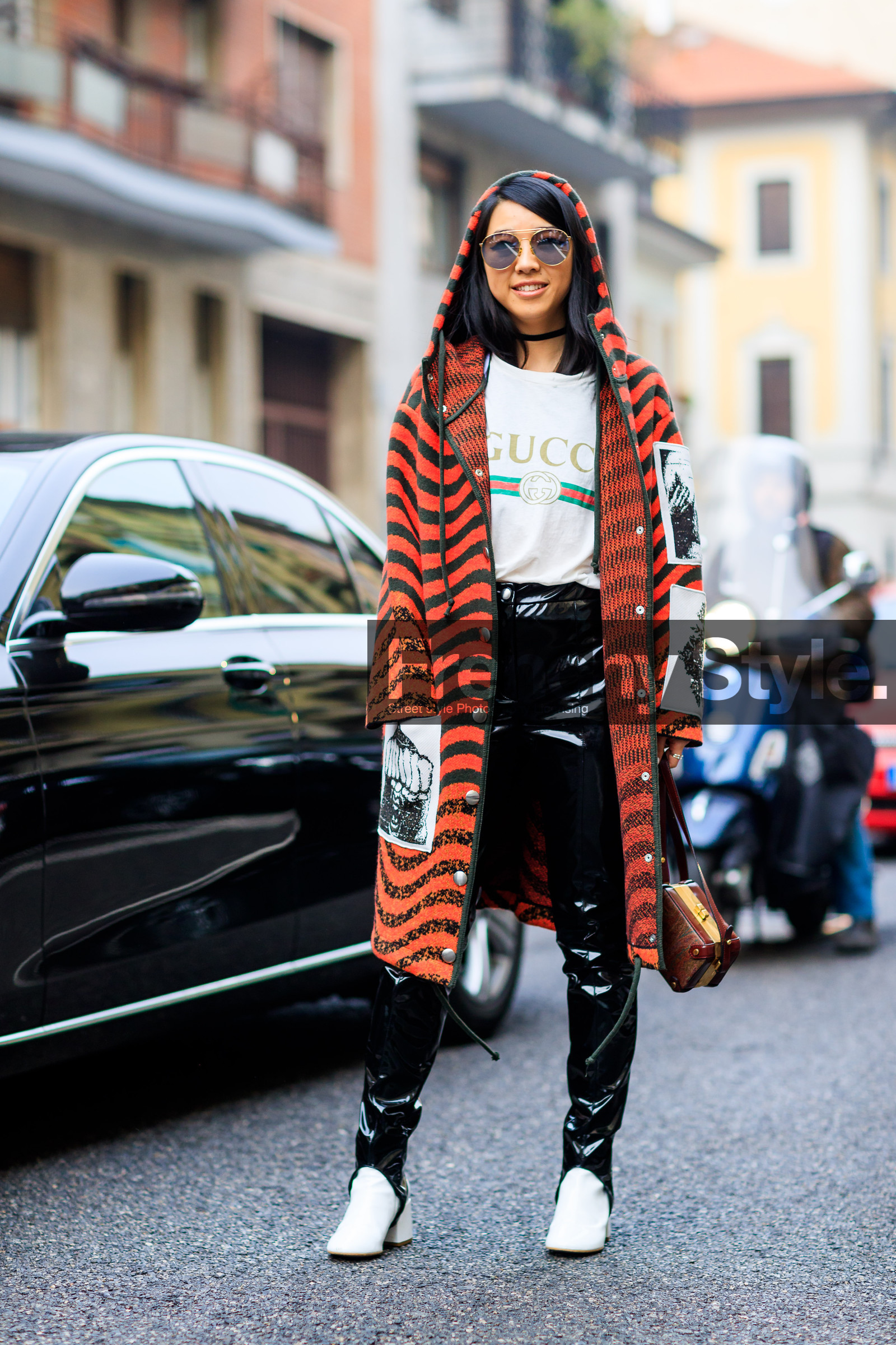 AUTUMN WINTER 2017-2018, AW 17-18, black pants, dries van noten, FALL WINTER 2017-2018, fashion week, frenchystyle, full length, FW, FW 17-18, geometric, graphic coat, gucci, high heels, hood, jonathan paciullo, leather bag, leather pants, leather shoes, MFW, MILAN, orange coat, printed coat, printed t shirt, red bag, stir pants, street style, sunglasses, trousers, varnished leather, vertical, vinyl, white boots, white t shirt