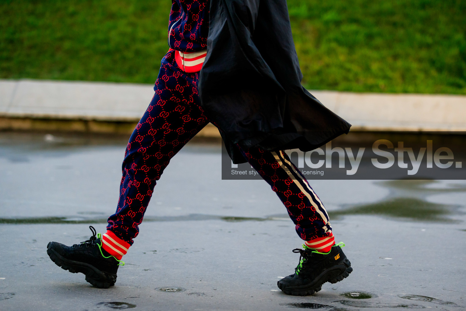 black trench coat, navy blue pants, navy blue sweatshirt, navy blue cardigan, red cardigan, red pants, red sweatshirt, monogrammed cardigan, monogrammed pants, monogrammed sweatshirt, striped pants, black sneackers, neon green sneakers, caterpilar shoes, legs detail, close up detail, gucci pants, fashion week, frenchystyle, FW, jonathan paciullo, street style, PFW, PARIS, AUTUMN WINTER 2020-2021, FALL WINTER 2020-2021, FW 20-21, horizontal, detail, atmosphere details