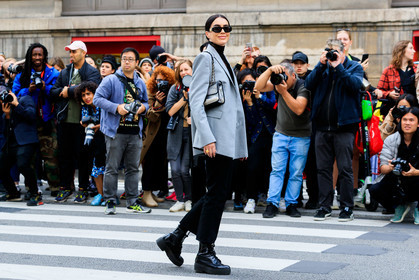 brittany xavier, light green jacket, black blouse, black denim pants, lace blouse, high collar blouse, black sunglasses, butterfly sunglasses, versace sunglasses, chanel bag, sheer bag, plastic bag, shoulder bag, chain strap bag, flat boots, black leather boots, low boots, big sole boots, PARIS, PFW, SPRING SUMMER 2020, SS 20, fashion week, frenchystyle, FW, jonathan paciullo, street style, horizontal, atmosphere details, full length
